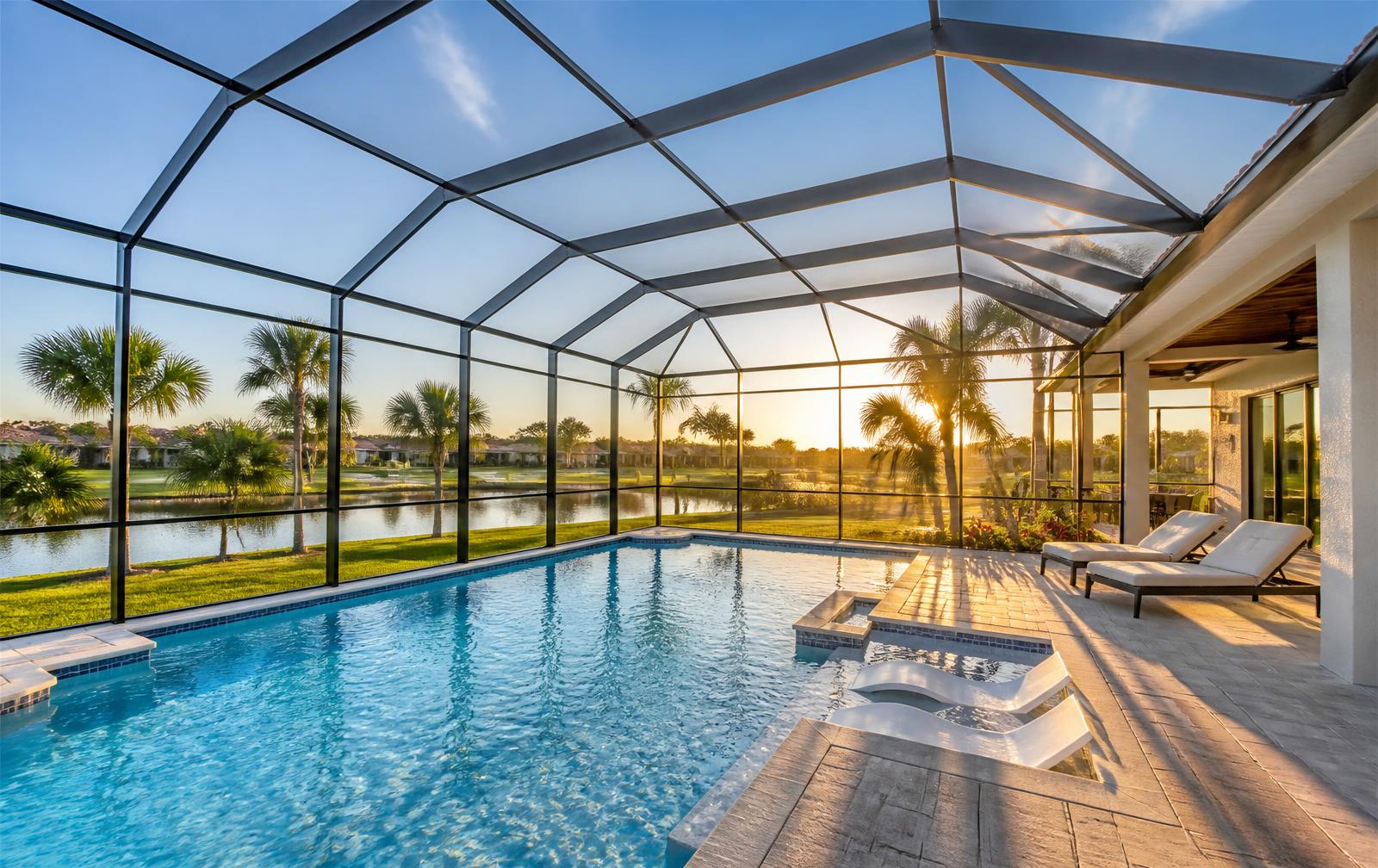 Freshly rescreened Florida pool cage enclosure at sunset
